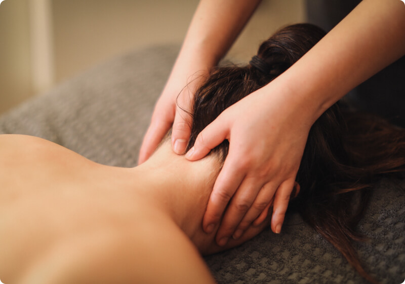 Lady receiving an Indian head massage